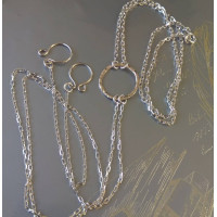 O-ring choker with chains and nipple rings. Sterling silver