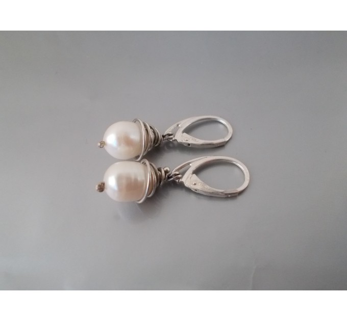 Sterling silver earrings with natural pearls