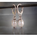 Sterling silver earrings with natural pearls