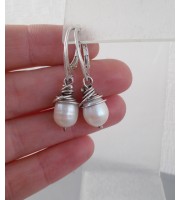 Sterling silver earrings with natural pearls