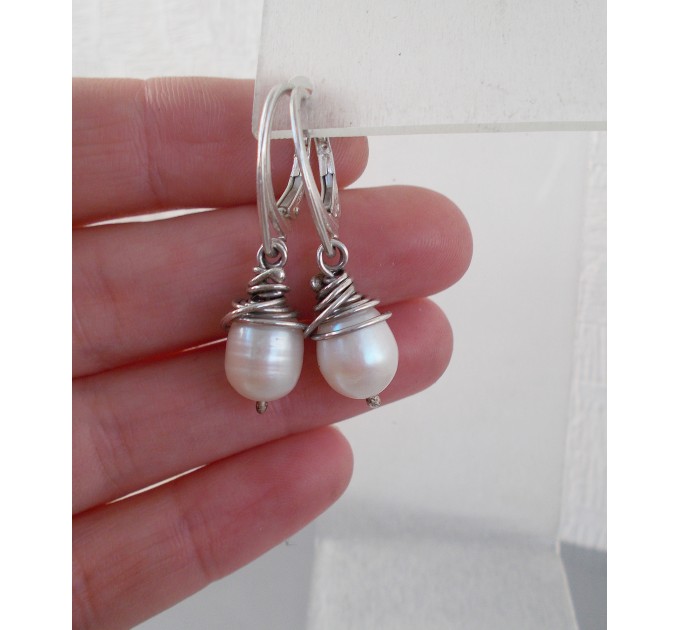 Sterling silver earrings with natural pearls