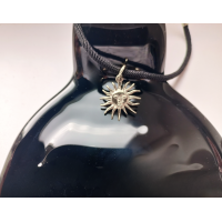 Sun choker with black leather cord. Handmade in silver orbrass