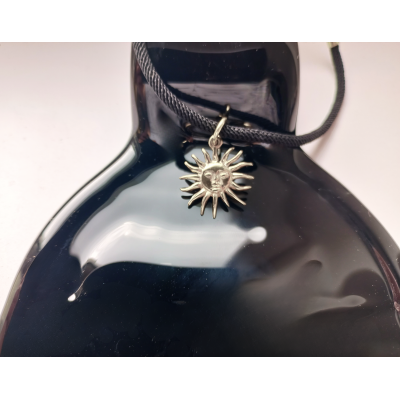Sun choker with black leather cord. Handmade in silver orbrass Sun choker with black leather cord. Handmade in silver orbrass