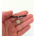 Sun choker with black leather cord. Handmade in silver or
brass