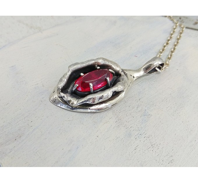 Silver yoni pendant with ruby