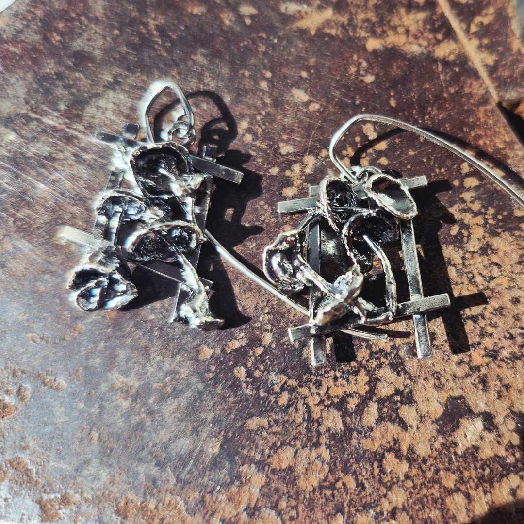 These one-of-a-kind handcrafted sterling silver designs were created using organic forms, molten textures, and natural p